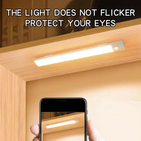 Under-cabinet light fixture with smartphone showing close-up of light, text 'The light does not flicker protect your eyes'.