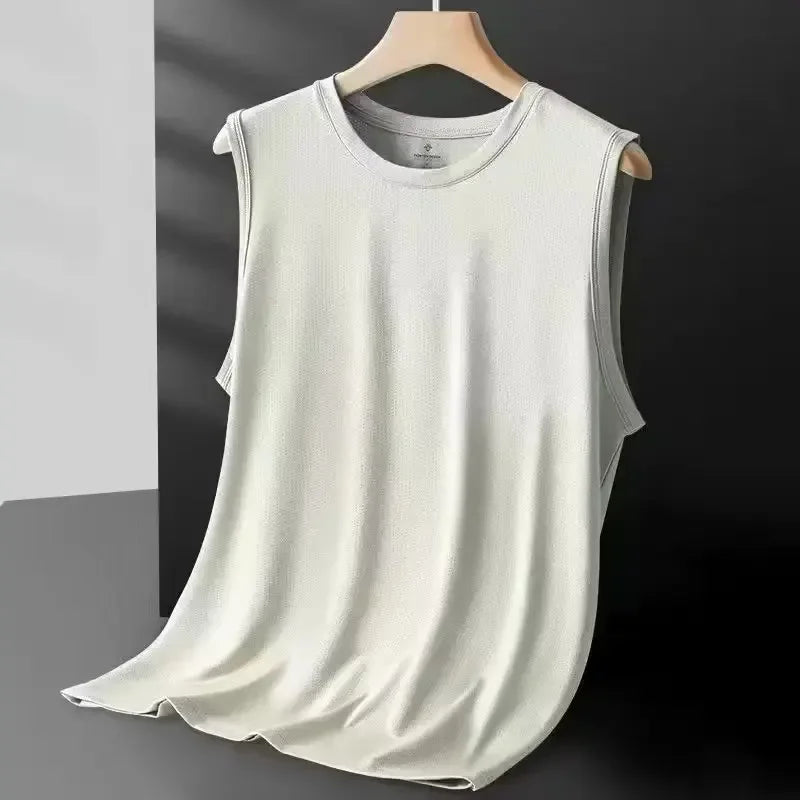 White sleeveless shirt on a hanger against a black background