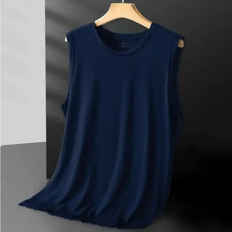 Blue sleeveless top on a hanger against a dark background
