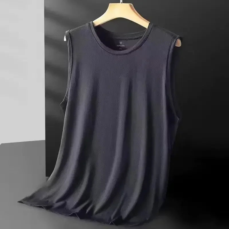 Black sleeveless shirt on a hanger against a dark background