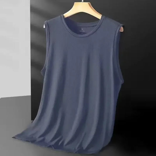 Blue sleeveless shirt on a hanger against a dark background